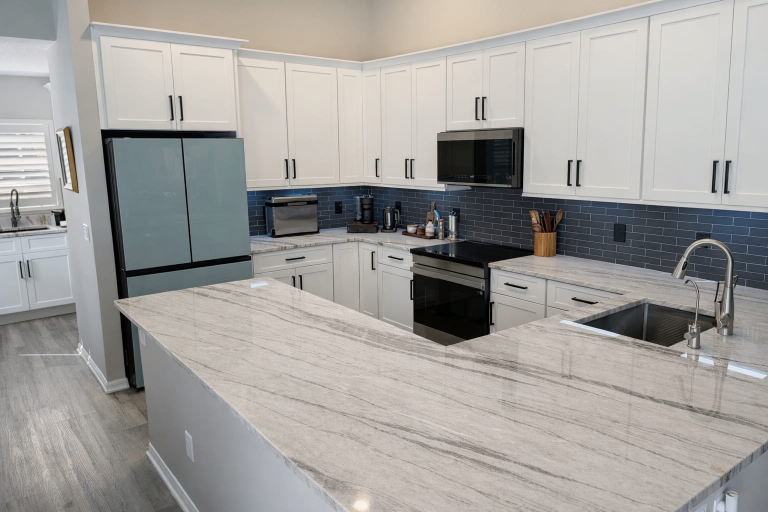 Modern kitchen with white quartz countertops
